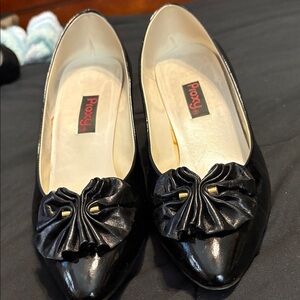 Proxy Black Patent heels with Decorative Rosette